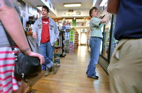 Suzanne Schalow (left) and Kate Baker opened the first Craft Beer Cellar in Belmont in 2010. Talking about the store?s franchising, Schalow said, ?We?ve said yes to some of the wrong people.?
